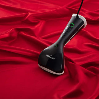 Clothes Steamer versus the Iron